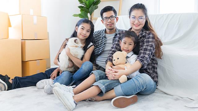 family with moving boxes